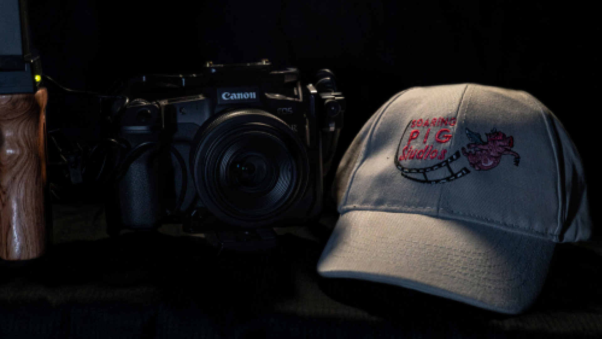 video production services - Soaring Pig Studios Hat and Camera