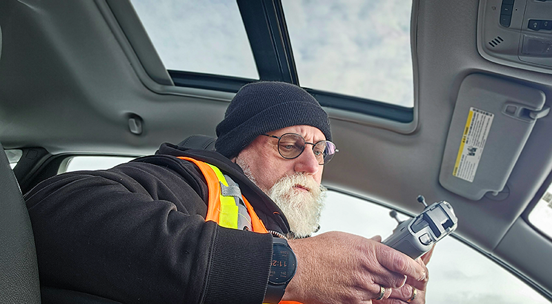 Soaring Pig Studios owner Stephen Dafoe setting up for a drone flight. When you hire the company, it is the owner doing the planning and practical work on your project.